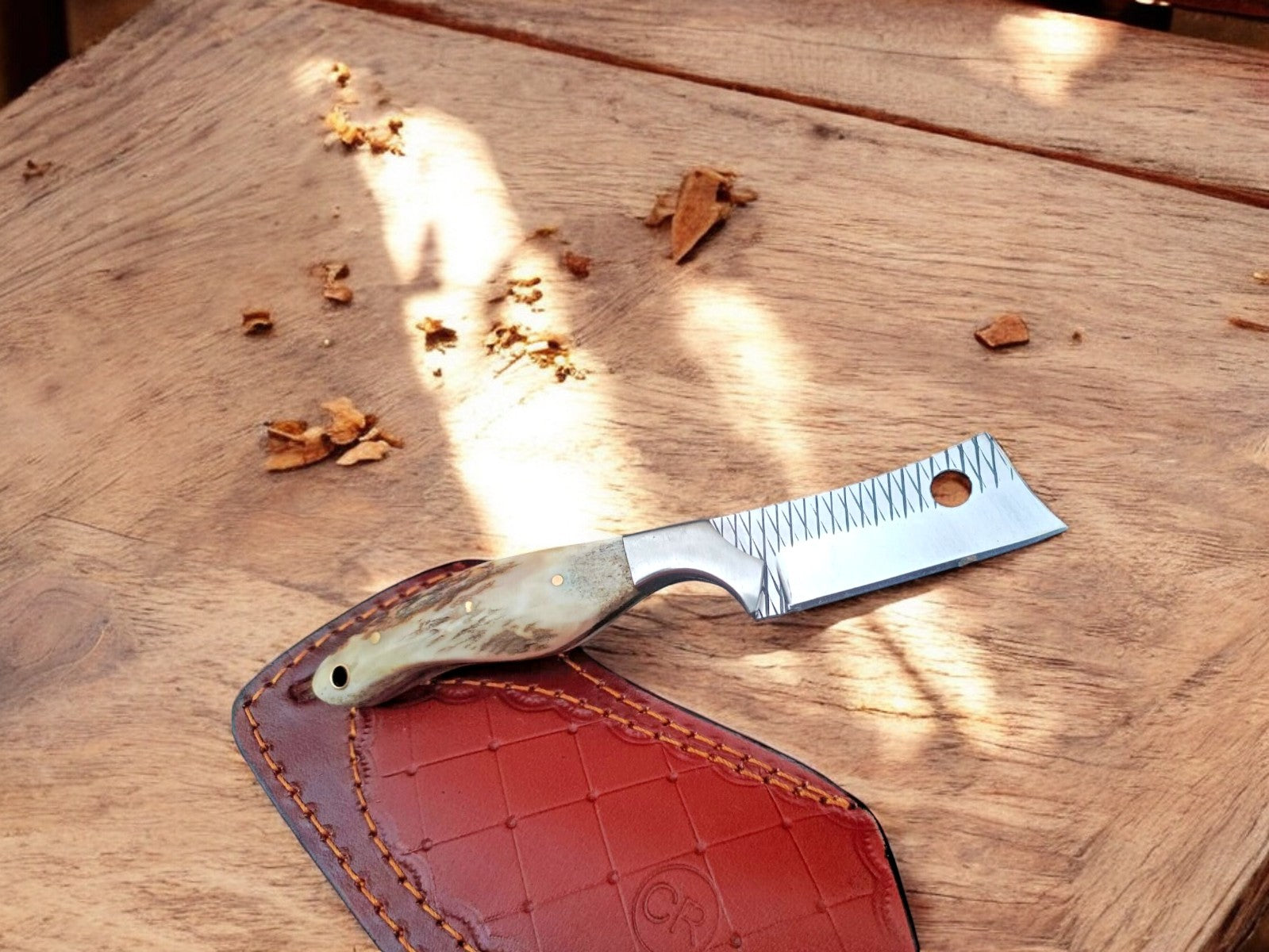 Close-up of the Rasp Bull Cutter Knife with antler handle.
