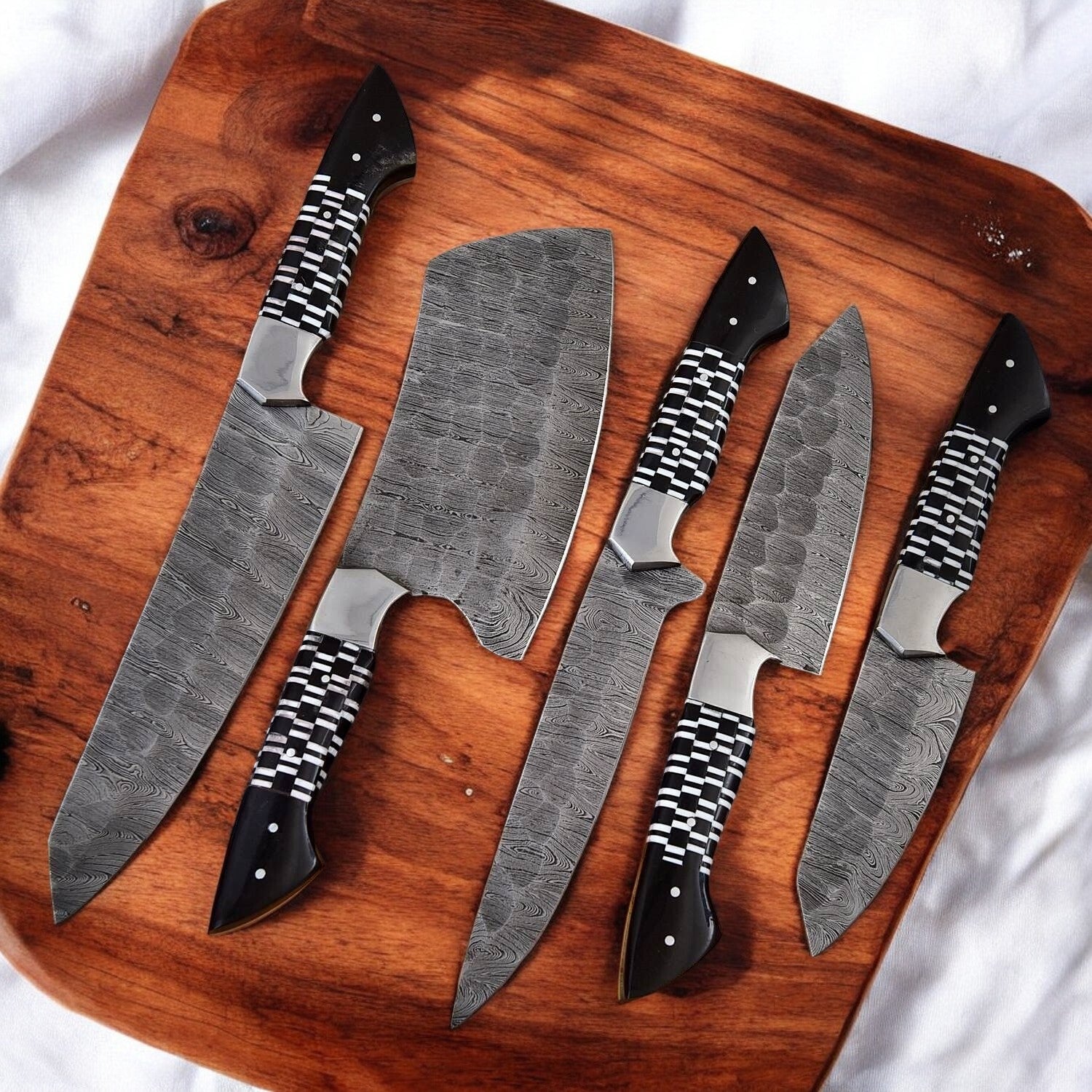 Premium custom kitchen knives with epoxy resin handles.
