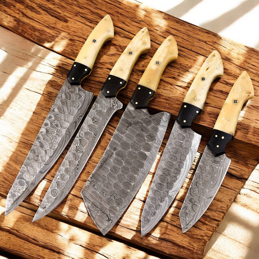 Close-up of Damascus steel blade with intricate patterns.
