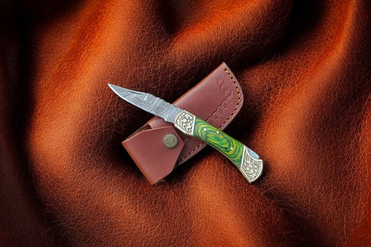 "Foldable knife with leather case and exotic wood handle"
