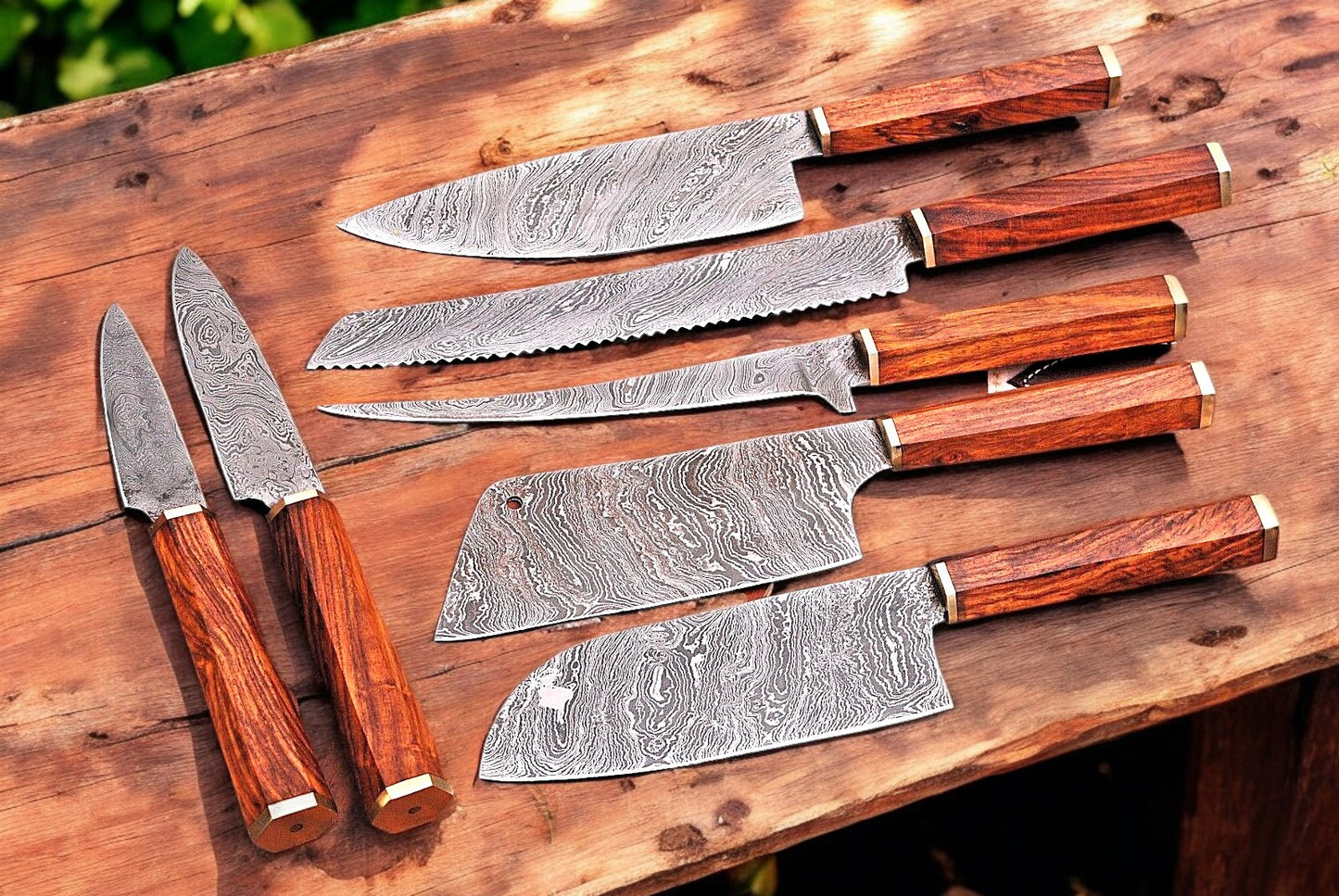 Close-up of Damascus steel blade with intricate patterns.
