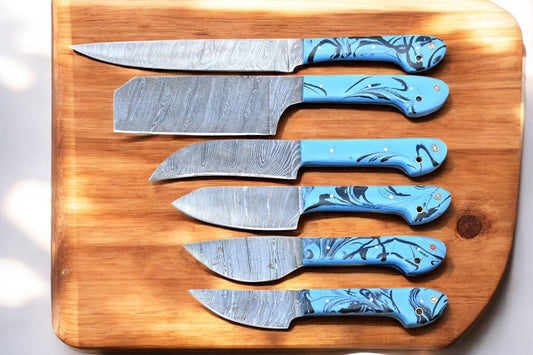 "Damascus steel kitchen knives with epoxy resin handles"
