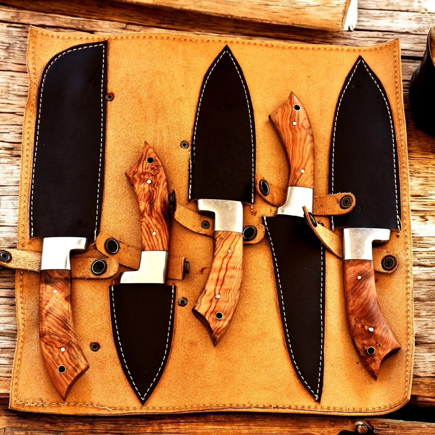 The custom kitchen knives set packaged neatly in its leather roll.
