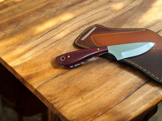 Custom cowboy knife with D2 tool steel blade and micarta handle.
