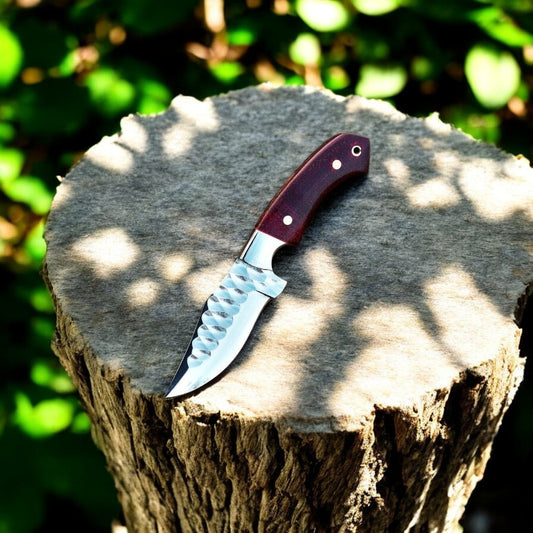 Full view of handmade hunting skinning knife with micarta handle.
