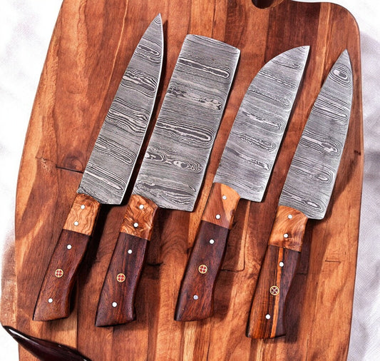 Handmade Damascus knives set with olivewood and rosewood handles.
