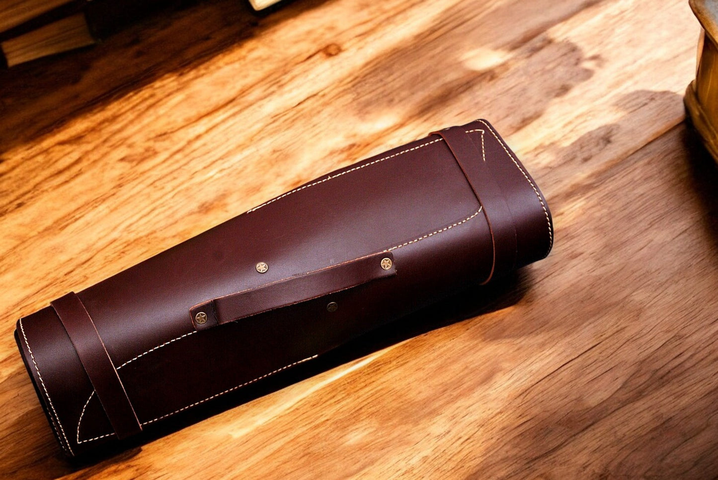 Leather roll for storing handmade chef knives.
